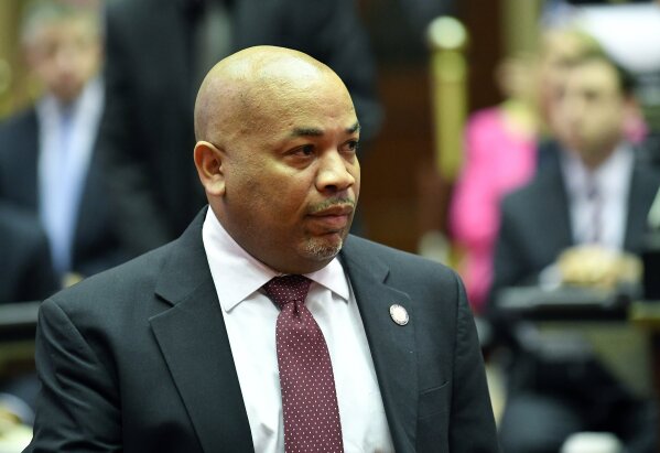 
              Assembly Speaker Carl Heastie, D-Bronx, left, walks on the Assembly floor as members of the New York state Assembly debate legislation that authorizes state tax officials to release, if requested, individual New York state tax returns to Congress during a vote in the Assembly Chamber at the state Capitol Wednesday, May 22, 2019, in Albany, N.Y. (AP Photo/Hans Pennink)
            