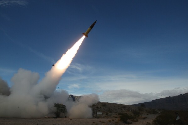 FILE - In this image provided by the U.S. Army, soldiers, from the 3rd Battalion, 321st Field Artillery Regiment of the 18th Field Artillery Brigade out of Fort Bragg N.C., conduct live fire testing at White Sands Missile Range, N.M., on Dec. 14, 2021, of early versions of the Army Tactical Missile System. U.S. officials say Ukraine for the first time has begun using long-range ballistic missiles, striking a Russian military airfield in Crimea and Russian troops in another occupied area overnight. The strikes come about a month after the U.S. secretly provided the weapons so that Ukraine could strike targets up to 190 miles away. (John Hamilton/U.S. Army via AP, file)