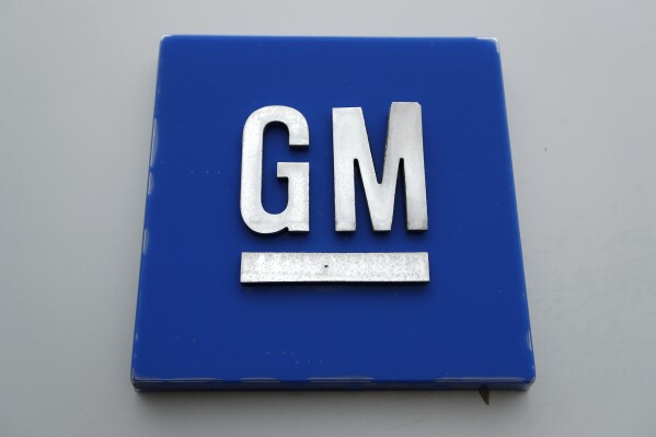 The General Motors logo is displayed at the General Motors Detroit-Hamtramck Assembly plant in Hamtramck, Mich., Jan. 27, 2020. (AP Photo/Paul Sancya, File)