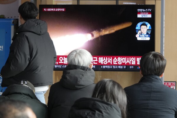 A TV screen shows a file image of North Korea's missile launch during a news program at the Seoul Railway Station in Seoul, South Korea, Sunday, Jan. 28, 2024. South Korea's military said Sunday that North Korea fired several cruise missiles that flew over waters near a major military shipyard on the country's eastern coast, extending a streak in weapons tests that are worsening tensions with the United States, South Korea and Japan. (AP Photo/Ahn Young-joon)