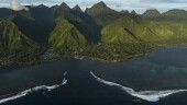 The surf breaks onto the lagoon in Teahupo'o, Tahiti, French Polynesia, Saturday, Jan. 13, 2024. The decision to host part of the Olympic Games here has thrust unprecedented challenges onto a small community that has long cherished and strives to protect its way of life. (AP Photo/Daniel Cole)