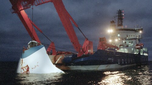 FILE - In this Nov. 18, 1994 file photo, the bow door of the sunken passenger ferry M/S Estonia is lifted up from the bottom of the sea, off Uto Island, in the Baltic Sea. A research vessel with investigators from Sweden and Estonia is scheduled to arrive at the site of the wreckage of a passenger ferry in the Baltic Sea for underwater studies that are hoped to produce new information about a maritime disaster that occurred nearly 30 years ago. (Jaakko Aiikainen/Lehtikuva via AP, File)