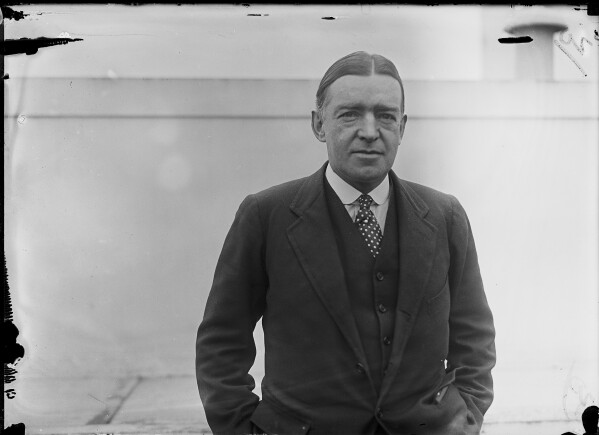 FILE - Sir Ernest Shackleton, a noted explorer and writer, is shown as he arrived in New York on the Aquitania, on a hurried business trip to Canada, Jan. 30, 1921. The wreck of the last ship belonging to the famed explorer of Antarctica has been found off the coast of Canada by an international team led by the Royal Canadian Geographical Society. The Quest was found using sonar scans on Sunday evening, June 9, 2024, sitting on its keel under 390 meters of churning, frigid water. (AP Photo, File)