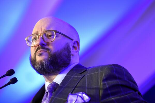 State party Chairman Trav Robertson speaks at a South Carolina Democratic Party dinner in Charleston, S.C., Feb. 24, 2020. Robertson, the leader of South Carolina's Democrats, said Wednesday that he won't seek another term as party chair as the state prepares to host the party's first 2024 presidential primary in the nation. (AP Photo/Meg Kinnard, File)