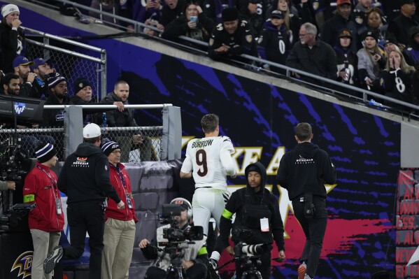 Cincinnati Bengals quarterback Joe Burrow (9) leaves the field in the first half of an NFL football game against the Baltimore Ravens in Baltimore, Thursday, Nov. 16, 2023. (AP Photo/Matt Rourke)