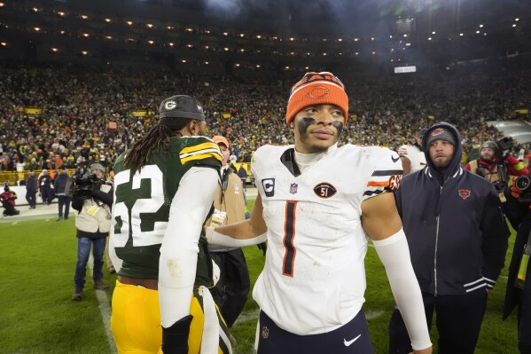 Chicago Bears quarterback Justin Fields (1) heads off the field following an NFL football game against the Green Bay Packers Sunday, Jan. 7, 2024, in Green Bay, Wis. The Packers won 17-9. (AP Photo/Morry Gash)