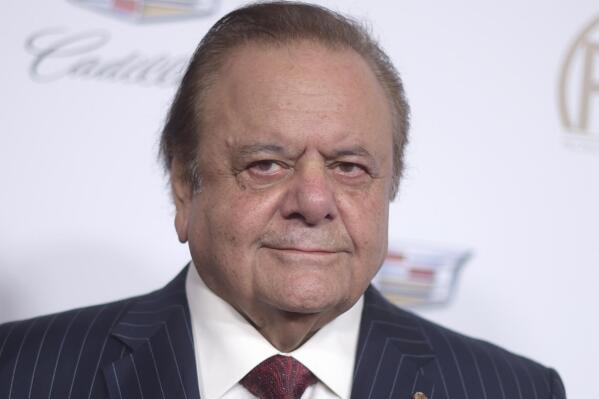 FILE - Paul Sorvino arrives at the 29th annual Producers Guild Awards at the Beverly Hilton on Saturday, Jan. 20, 2018, in Beverly Hills, Calif. Sorvino, an imposing actor who specialized in playing crooks and cops like Paulie Cicero in “Goodfellas” and the NYPD sergeant Phil Cerretta on “Law & Order,” has died. He was 83.  (Photo by Richard Shotwell/Invision/AP, File)