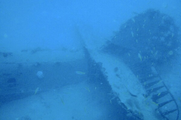 In this undated photo provided by the Australian Defence Force, wreckage of a World War II bomber lays on the seabed of Gasmata Harbour in West New Britain Province, Papua New Guinea. Officials have confirmed the identities of an Australian bomber and the remains of two air crew members more than 80 years after they crashed in flames off the coast of Papua New Guinea, Australian Air Force said in a statement on Wednesday, April 10, 2024. (Australian Defence Force via AP)