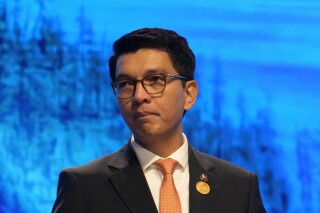 FILE - Andry Nirina Rajoelina, president of Madagascar, speaks at the COP27 U.N. Climate Summit, Tuesday, Nov. 8, 2022, in Sharm el-Sheikh, Egypt. Madagascar鈥檚 Parliament has passed a law allowing for the chemical and in some cases surgical castration of those found guilty of the rape of a minor. It has prompted criticism from international rights groups but has also found support from activists in the country who say it鈥檚 an appropriate deterrent to try and curb a 鈥渞ape culture.鈥� (AP Photo/Peter Dejong, File)