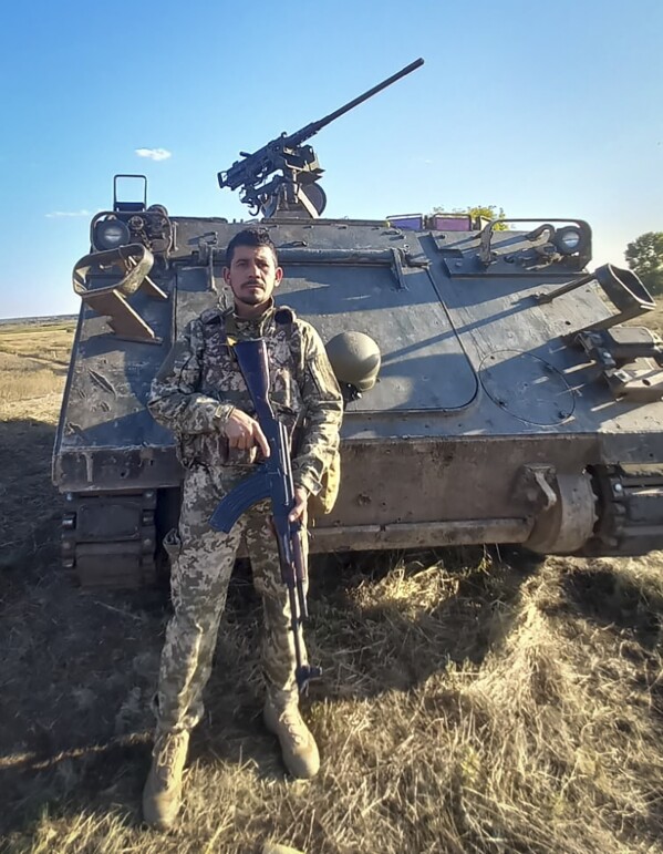 This 2023 photo provided by Oscar Triana's Colombian comrade who uses the call sign Oso Polar shows Triana, a retired soldier from Bogotá who joined the Ukrainian army in August 2023, at an undisclosed location in Ukraine. Oso Polar was the last person to see Triana alive on October 8, 2023. He says Triana’s unit was ambushed by Russian forces in the Kharkiv region, after which his fate was unknown. The Ukrainian military unit where Triana was serving confirmed to AP that Triana is officially missing but would not disclose any details surrounding the circumstances in which he disappeared. (Oso Polar via AP)