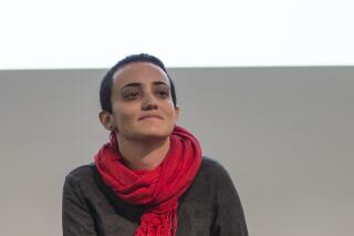 FILE - Lina Attalah, editor-in-chief of Mada Masr, participates in a panel discussion at cultural center in Cairo, Egypt, Nov. 24, 2017. Egyptian prosecutors have charged Attalah and three other journalists from Mada Masr, one of the country's few remaining independent news outlets, of spreading false news and disturbing public peace, the news website said in a statement. Mada Masr said late Wednesday, Sept. 8, 2022, that the journalists were released on bail following their interrogation. At issue is an article saying that senior members of a pro-government political party were implicated in a corruption case. (AP Photo/Roger Anis, File)