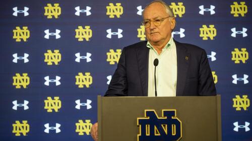 FILE - Notre Dame athletic director Jack Swarbrick answers questions regarding NCAA college football head coach Brian Kelly's resignation, Tuesday, Nov. 30, 2021, at Notre Dame Stadium in South Bend, Ind. Jack Swarbrick will step down as Notre Dame’s athletic director next year after a 16-year run in which he helped the school maintain its independent status amid an unprecedented flurry of conference realignment. Notre Dame announced Thursday, June 8, 2023, that NBC Sports chairman Pete Bevacqua will succeed Swarbrick. (Michael Caterina/South Bend Tribune via AP, File)