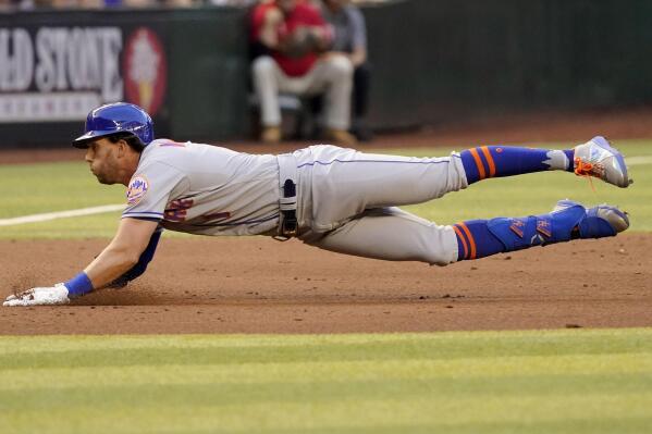 Arizona Diamondbacks' Eduardo Escobar watches his RBI single