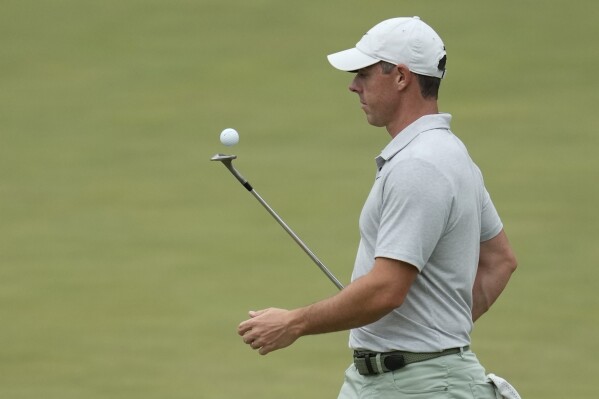 Rory McIlroy, of Northern Ireland, walks off the 11th green during a practice round in preparation for the Masters golf tournament at Augusta National Golf Club Tuesday, April 9, 2024, in Augusta, Ga. (AP Photo/Ashley Landis)