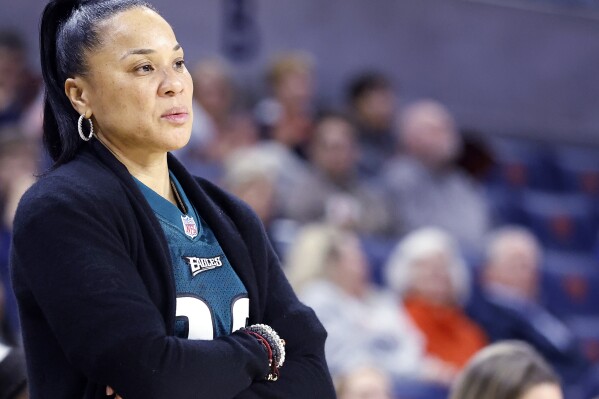 South Carolina head coach Dawn Staley watches during the second half of an NCAA college basketball game against Auburn, Feb. 9, 2023, in Auburn, Ala. Staley embraced the change on her South Carolina Gamecocks. If only things came a little bit quicker. Staley opened practice Thursday, Sept. 28 2023 minus the skilled and accomplished “Freshies,” led by All-Americans Aliyah Boston and Zia Cooke who left a legacy of trophies and championships for this team to match. (AP Photo/Butch Dill)