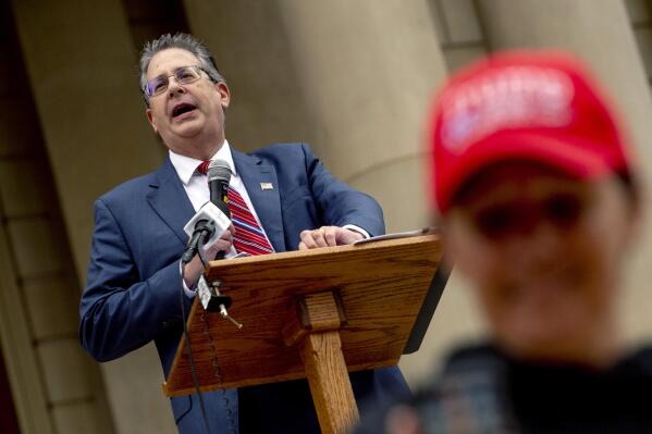 FILE - Matthew DePerno, Republican candidate for Michigan Attorney General, speaks during a rally at the Michigan state Capitol, Oct. 12, 2021, in Lansing, Mich. (Jake May/The Flint Journal via AP, File)
