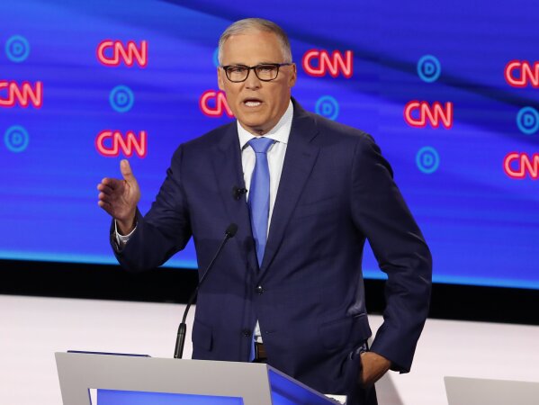FILE - In this July 31, 2019, file photo, Washington Gov. Jay Inslee speaks during the second of two Democratic presidential primary debates hosted by CNN in Detroit. Inslee, who made fighting climate change the central theme of his presidential campaign, announced Wednesday night, Aug. 21, that he is ending his bid for the 2020 Democratic nomination. (AP Photo/Paul Sancya, File)