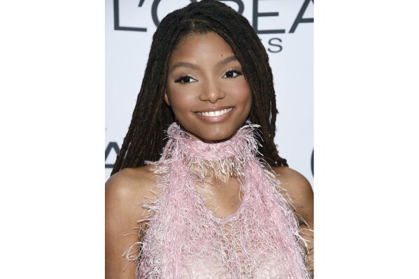 FILE - This Nov. 13, 2017 file photo shows singer-actress Halle Bailey at the 2017 Glamour Women of the Year Awards in New York. Bailey, half of the sister duo Chloe x Halle, will next be going under the sea, starring as Ariel in the upcoming adaptation of “The Little Mermaid.” The live-action version will include original songs from the 1989 animated hit as well as new tunes from original composer Alan Menken and “Hamilton” creator Lin-Manuel Miranda. (Photo by Evan Agostini/Invision/AP, File)