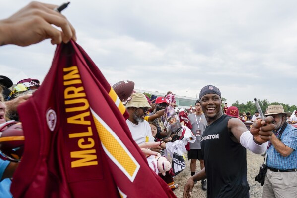 Fans return to Washington Commanders camp to celebrate the team's ownership  change