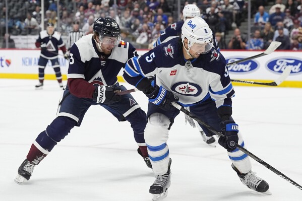 Jets’ Brenden Dillon day-to-day after receiving stitches on hand for apparent cut from skate blade