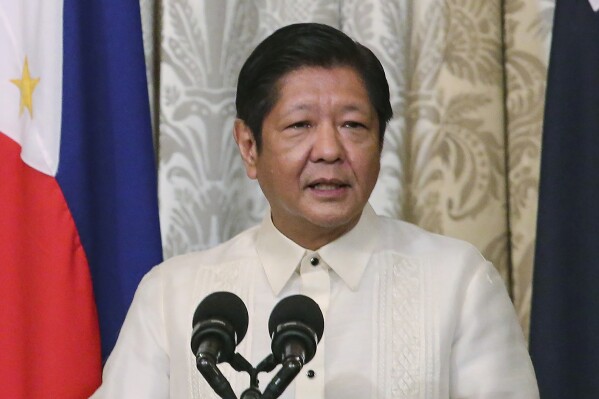 FILE - Philippine President Ferdinand Marcos Jr. speaks during a joint press statement with Australia's Prime Minister Anthony Albanese at the Malacanang palace in Manila, on Sept. 8, 2023. Marcos said Friday, Sept. 29, 2023 that his country does not want a confrontation but will staunchly defend its waters after the coast guard removed a floating barrier installed by China at a disputed shoal in the South China Sea. (Earvin Perias/Pool Photo via AP, File)