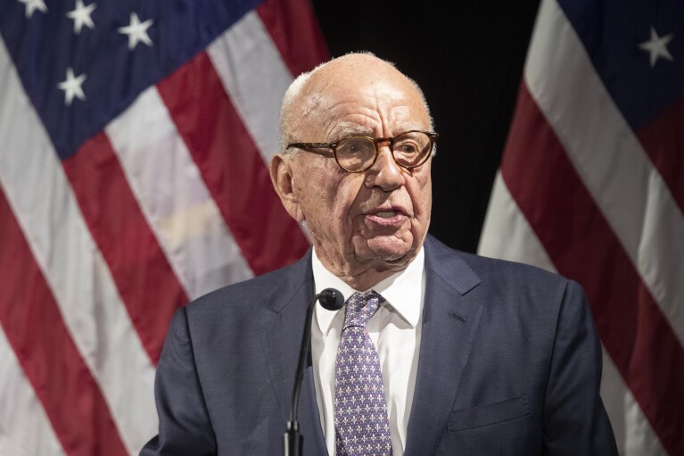 FILE - Rupert Murdoch introduces Secretary of State Mike Pompeo during the Herman Kahn Award Gala, in New York, Oct. 30, 2018. (AP Photo/Mary Altaffer, File)