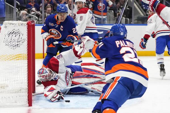 Islanders whip Canadiens to clinch playoff spot