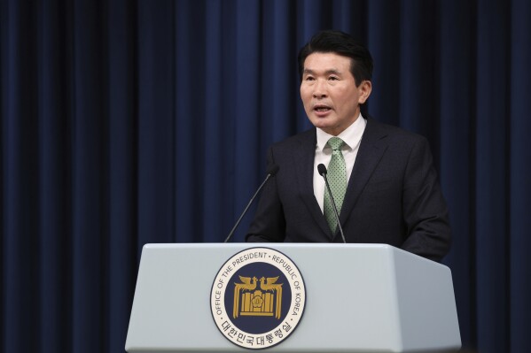 South Korea's presidential office's senior secretary for civil and social affairs Hwang Sang Moo briefs at the presidential office in Seoul, South Korea, Monday, Jan. 22, 2024. South Korea’s presidential office said Monday it approved a request by the country’s Truth and Reconciliation Commission to extend its term by a year through late-May 2025. Investigators had been calling for more time to examine a broad range of human rights violations linked to Seoul’s past military governments, including a widespread falsifying of child origins that fueled a government-backed foreign adoption boom in the 1970s and '80s. (Jin Sung-chul/Yonhap via AP)