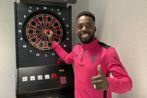 Athletic Club's forward Inaki Williams poses for a photo during an interview for The Associated Press in Barcelona, Spain, Friday, Dec. 29, 2023. Following a World Cup when emotions ran high but the goals failed to flow, Inaki Williams is eager to lead Ghana deep into the Africa Cup of Nations. Williams, the son of Ghanaian parents who migrated to Spain before he was born, declared his sporting allegiance for the country of his ancestors just five months before the 2022 World Cup. (AP Photo/German Martinez)