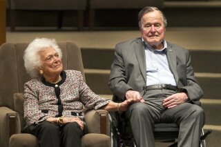 
              FILE - This March 8, 2017 file photo shows former U.S. President George H.W. Bush and former first lady Barbara Bush at an awards ceremony hosted by Congregation Beth Israel in Houston. George, who will turn 94 in June 2018, was hospitalized Sunday, April 22, 2018, with sepsis, an infection that spread to his bloodstream It's a serious condition at any age, but he is said to be responding to treatments and recovering. (Steve Gonzales/Houston Chronicle via AP, File)
            