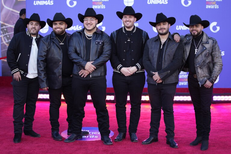 FILE - Grupo Frontera arrives at the Latin American Music Awards in Las Vegas on April 20, 2023. Regional Mexican music has become a global phenomenon, topping music charts, breaking streaming records and reaching new audiences as it crosses borders. (AP Photo/John Locher, File)