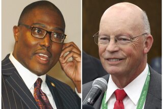 
              This combination of photos shows candidates for mayor of Little Rock, Ark., from left, Frank Scott and Baker Kurrus. Six decades after it was the center of a school desegregation fight, Little Rock may be on the verge of electing its first African-American mayor. Scott, a banking executive, is poised to break that barrier in the Dec. 4, 2018, runoff election against Kurrus, an attorney and businessman, in the race for the nonpartisan seat. (The Arkansas Democrat-Gazette via AP)
            