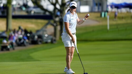 Leona Maguire, of Ireland, reacts to fans after making her putt on the 18th hole during the third round of the Women's PGA Championship golf tournament, Saturday, June 24, 2023, in Springfield, N.J. (AP Photo/Matt Rourke)
