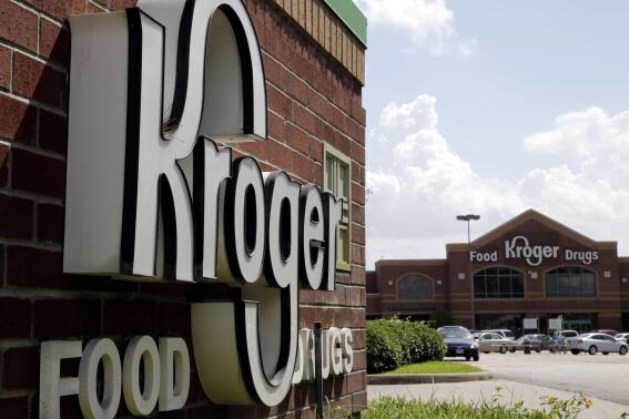 FILE - This June 17, 2014, file photo, shows a Kroger store in Houston. Billionaire Warren Buffett's company has again increased the size of its bet on grocery giant Kroger, while scaling back several of its health care industry investments. Berkshire Hathaway Inc. said in a quarterly update with regulators Monday, Aug. 16, 2021, that it picked up nearly 11 million shares of Kroger stock during the second quarter, raising its holdings to 61.8 million shares. Buffett's company has been steadily adding to its Kroger holdings in recent quarters. (AP Photo/David J. Phillip, File)
