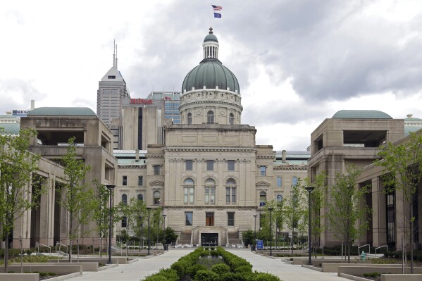 FILE - The Indiana Statehouse appears on May 5, 2017, in Indianapolis. Four statewide elected officials in Indiana including the attorney general and secretary of state will be allowed to carry handguns in the state Capitol thanks to a bill sent to Republican Gov. Eric Holcomb Thursday, March 7, 2024. (AP Photo/Michael Conroy, File)