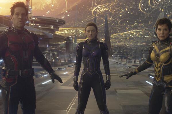 This image released by Disney shows Paul Rudd, from left, Kathryn Newton and Evangeline Lilly in a scene from "Ant-Man and the Wasp: Quantumania." (Disney/Marvel Studios via AP)