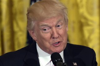 In this May 12, 2017, photo, President Donald Trump speaks to military mothers in the East Room of the White House during Mother's Day celebration. Four months into office, Trump has become distrustful of some of his White House staff, heavily reliant on a handful of family members and longtime aides, and furious that the White House’s attempts to quell the firestorm over the FBI and congressional Russia investigations only seem to add more fuel. (AP Photo/Susan Walsh)