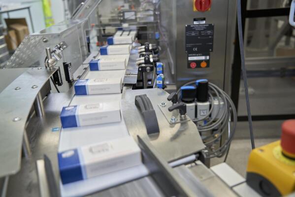 This image provided by Pfizer shows boxes for its COVID-19 pill. Drugmaker Pfizer said Tuesday, Nov. 16, 2021, it is submitting its experimental pill for U.S. authorization, setting the stage for a likely launch in coming weeks. (Pfizer via AP)