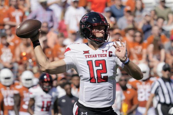 FILE - Texas Tech quarterback Tyler Shough (12) throws a pass during the first half of an NCAA college football game against Texas on Sept. 25, 2021, in Austin, Texas. Former Oregon transfer Tyler Shough threw for 872 yards and six touchdowns in his four games last season before breaking his collarbone.  (AP Photo/Chuck Burton, File)