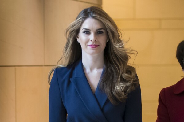 FILE - Hope Hicks, former White House Communications Director, arrives to meet with the House Intelligence Committee, at the Capitol in Washington, Feb. 27, 2018. Prosecutors say Hicks spoke with former President Donald Trump by phone during a frenzied effort to keep allegations of his marital infidelity out of the press after the infamous "Access Hollywood" tape leaked weeks before the 2016 election. In the tape, from 2005, Trump boasted about grabbing women without permission. (Ǻ Photo/J. Scott Applewhite, File)