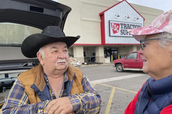 Larry Clark talks outside a supply store on Friday, Dec. 30, 2022, in Grand Junction, Colo. (AP Photo/Jesse Bedayn)