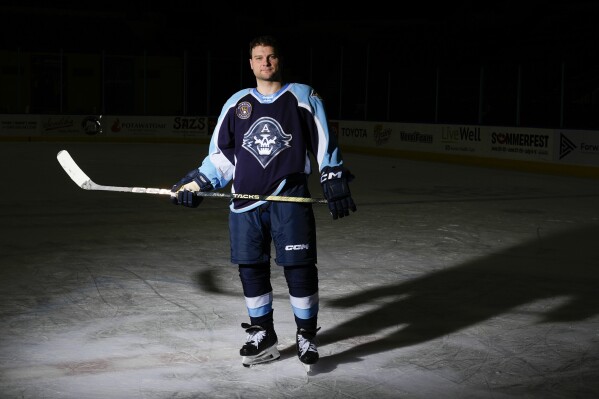 Milwaukee Admirals' Cody Hodgson of the American Hockey League poses for a picture Tuesday, March 5, 2024, in Milwaukee. Hodgson is a former NHL player who retired from hockey eight years ago due to a muscle disorder but is now making a comeback. (AP Photo/Morry Gash)