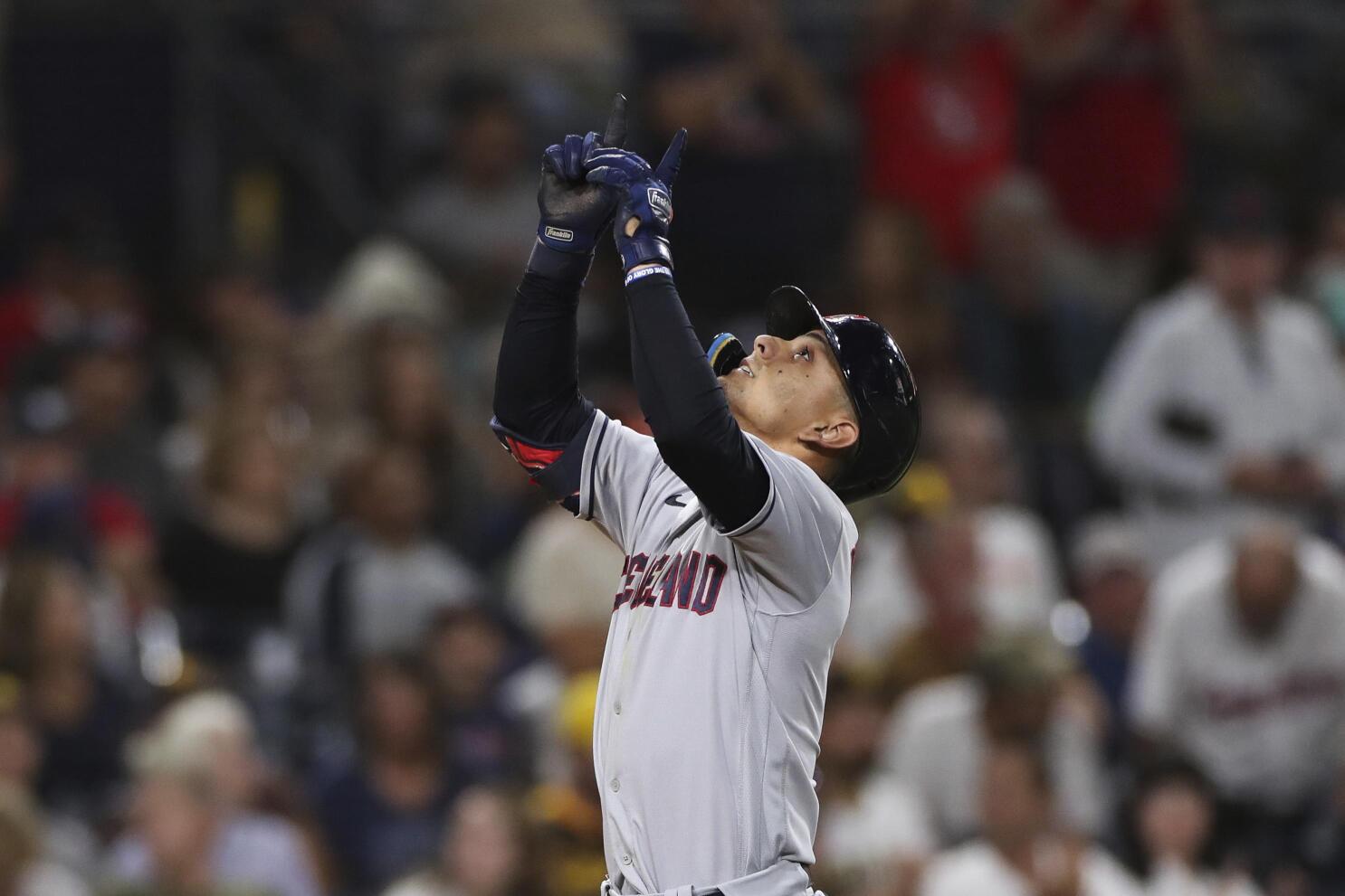 Cleveland Guardians' Oscar Gonzalez watches his ground out with