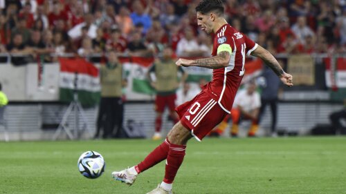 Hungary's Dominik Szoboszlai plays the ball during the Euro 2024 group G qualifying soccer match between Hungary and Lithuania in Budapest, Hungary, Tuesday, June 20, 2023. (Robert Hegedus/MTI via AP)