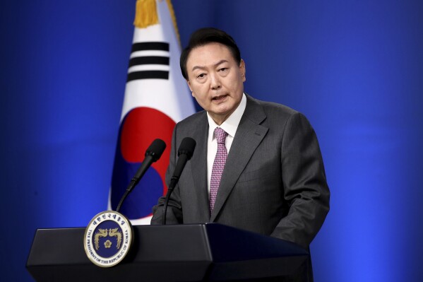 FILE - South Korean President Yoon Suk Yeol delivers a speech during a news conference to mark his first 100 days in office at the presidential office in Seoul, South Korea, Wednesday, Aug. 17, 2022. South Korean President Yoon Suk Yeol says he will discuss international cooperation in response to the purported North Korean-Russian weapons deal during the Asia-Pacific Economic Cooperation summit in San Francisco this week. (Chung Sung-Jun/Pool Photo via AP, File)
