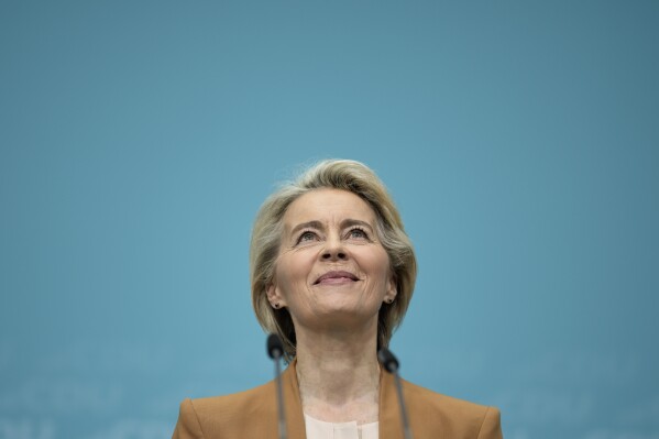 Ursula von der Leyen, President of the European Commission, looks up during a press conference after a board meeting of the Christian Democratic Union (CDU) in Berlin, Germany, Monday, Feb. 19, 2024. Ursula von der Leyen announced her intention to run for a second term as EU commission president. (APPhoto/Markus Schreiber)