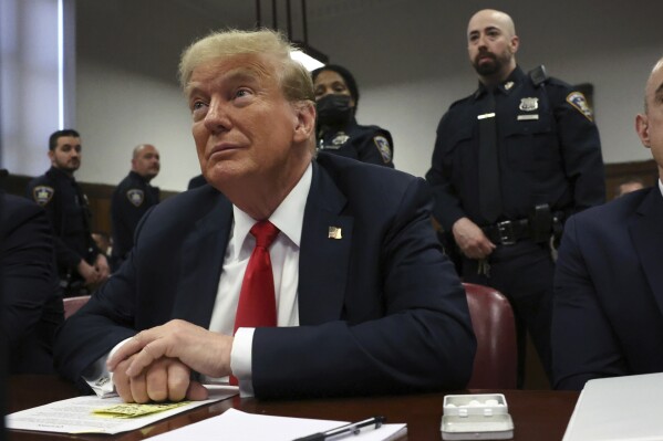 Former U.S. President Donald Trump sits in court during his trial for allegedly covering up hush money payments at Manhattan criminal court on Tuesday, May 28, 2024, in New York. Trump arrived for closing arguments in his trial ahead of the jury deciding whether to make him the first criminally convicted former president and current White House hopeful in history. (Spencer Platt/Pool Photo via AP)
