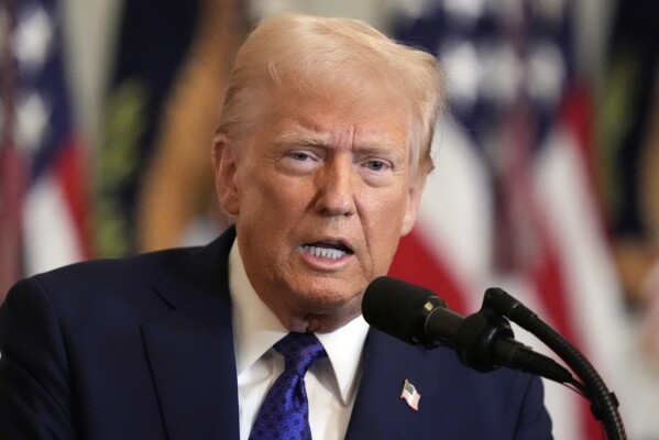 President Donald Trump speaks before signing the Laken Riley Act in the East Room of the White House, Wednesday, Jan. 29, 2025, in Washington. (AP Photo/Alex Brandon)