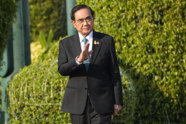 Thailand's Prime Minister Prayuth Chan-ocha arrives at Malaysia's Prime Minister Anwar Ibrahim at Government house in Bangkok, Thailand, Thursday, Feb. 9, 2023. Prayuth, who has declared he will seek another term in office, said Tuesday he will dissolve Parliament sometime in March, which would mean the general election will be likely be held on May 7. (AP Photo/Sakchai Lalit)