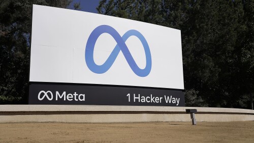 FILE - Facebook's Meta logo sign is seen at the company headquarters in Menlo Park, Calif., Oct. 28, 2021. Meta Platforms reports earnings on Wednesday, July 26, 2023. (AP Photo/Tony Avelar, File)